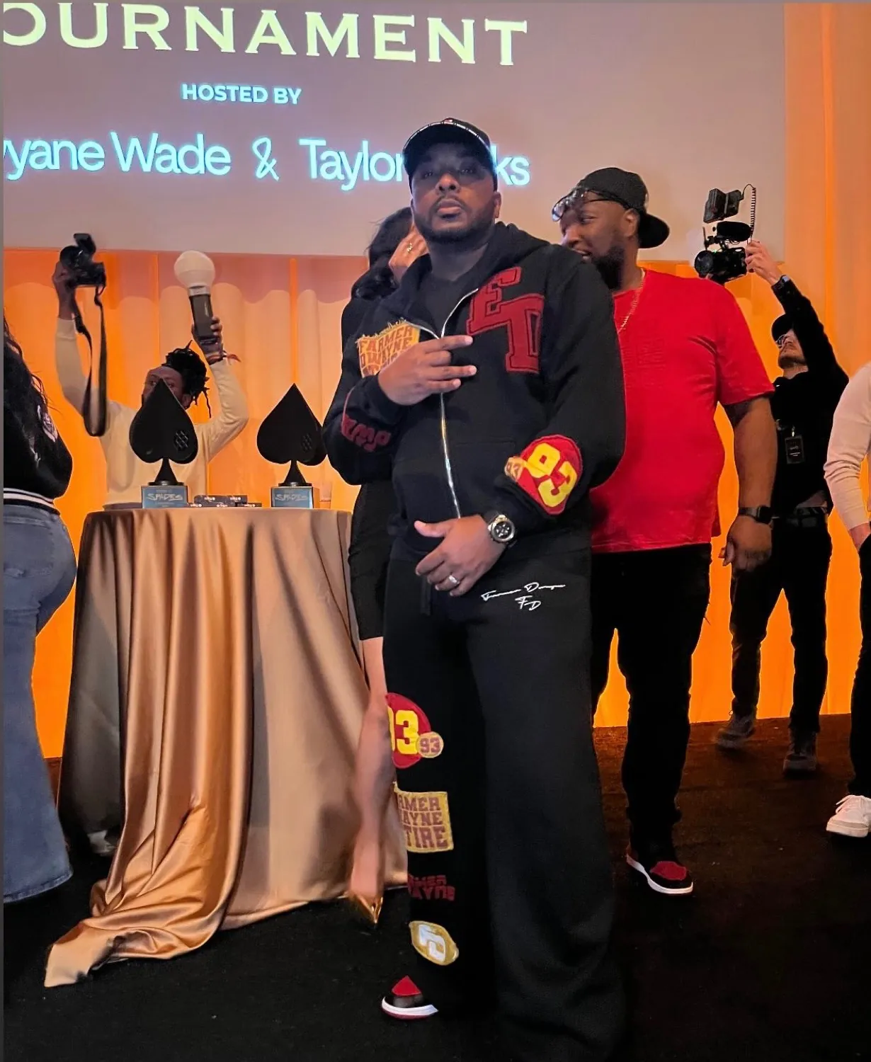 The Stance Spades tournament stage — champion trophies displayed beneath the event marquee