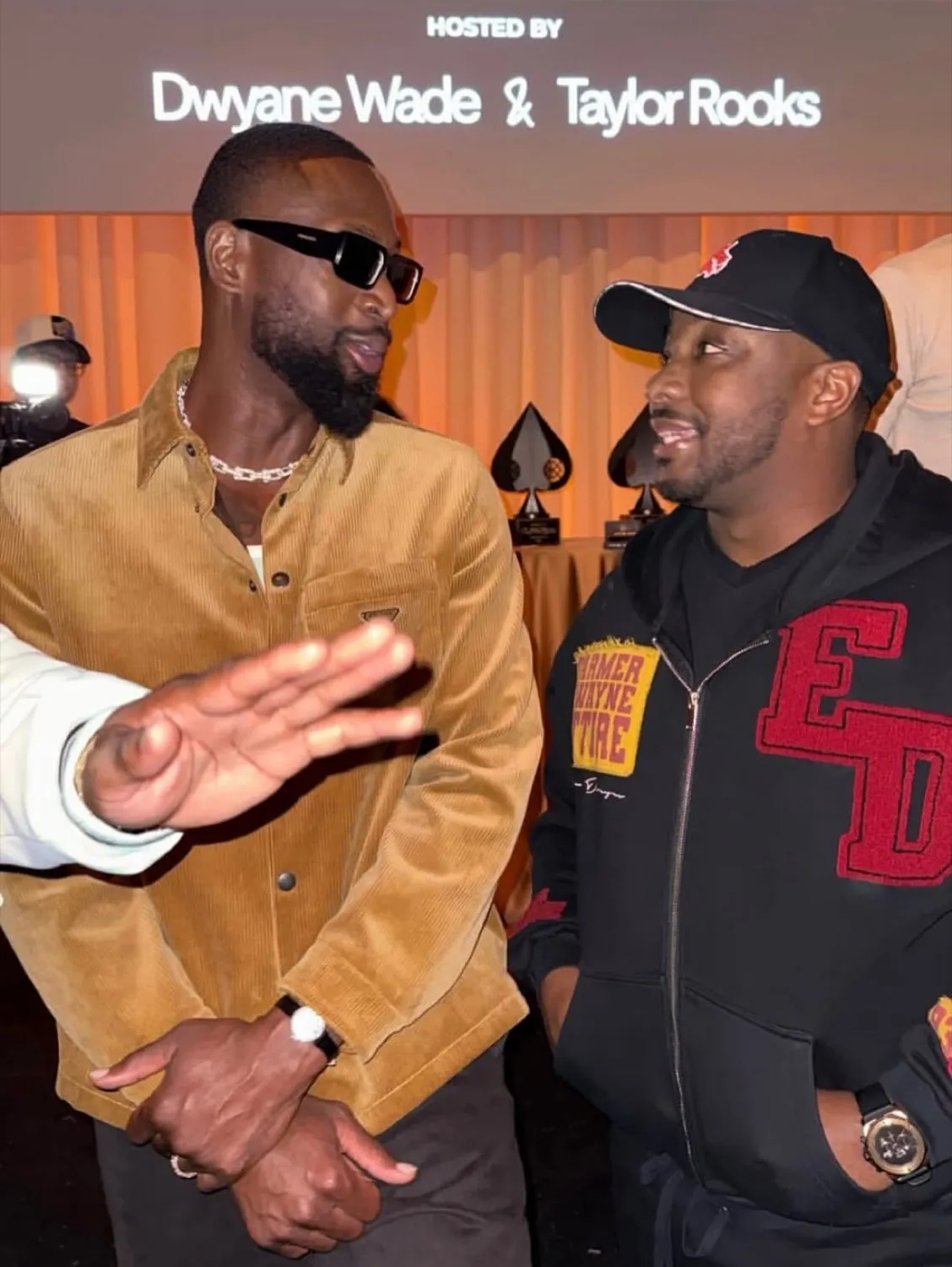 A host with a champion at the Stance Spades tournament